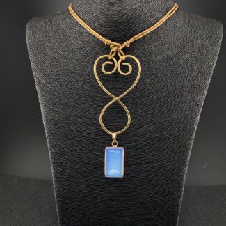 Handcrafted bronze pendant with a rectangular Copper Bezel Opalite gemstone