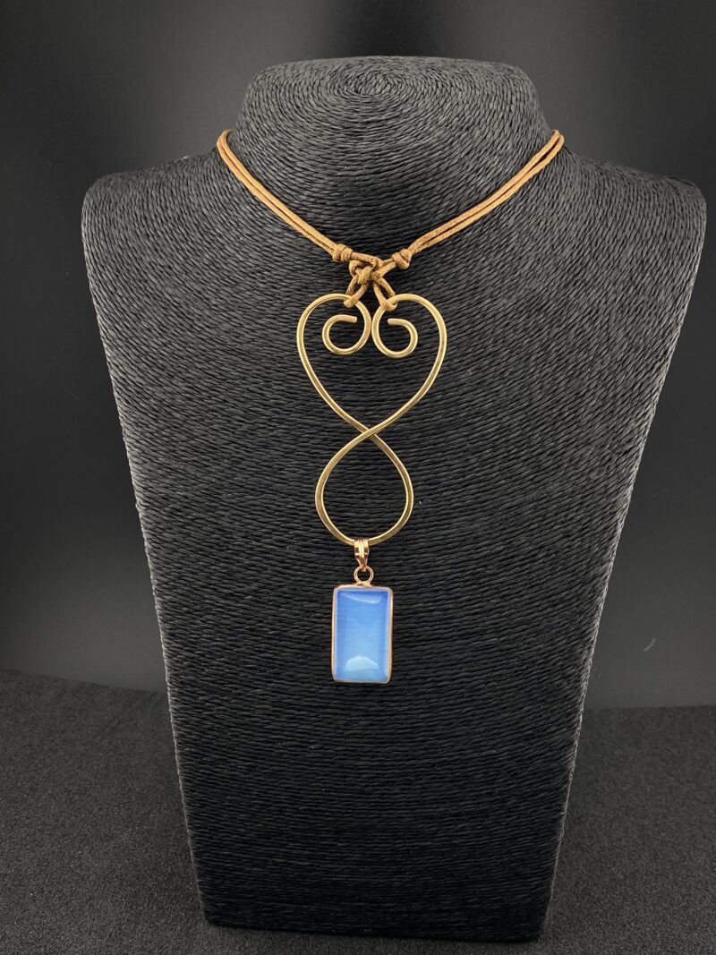 Handcrafted bronze pendant with a rectangular Copper Bezel Opalite gemstone